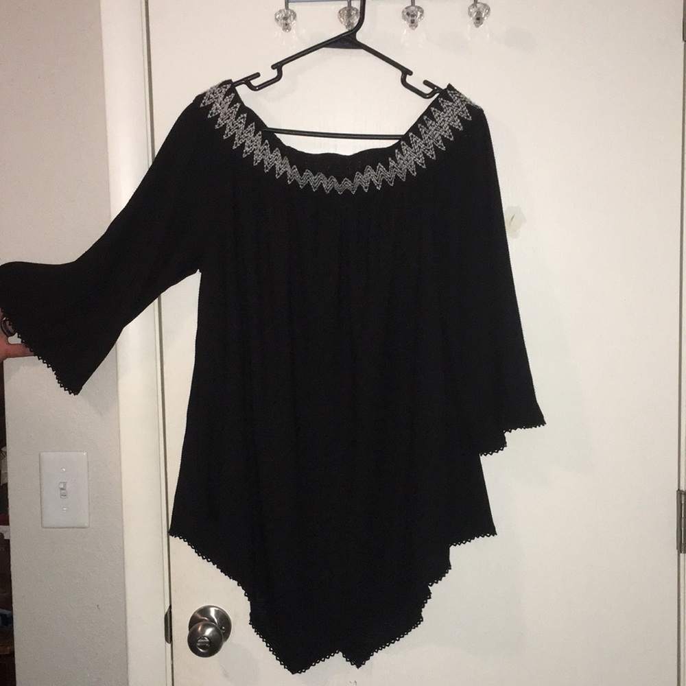 Black off the shoulder blouse.